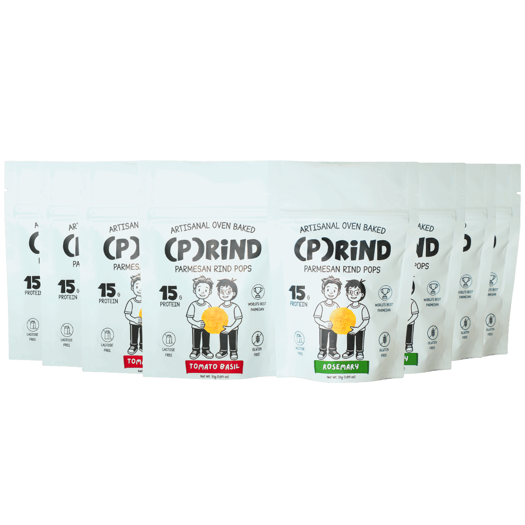 (P)RiND parmesan pops variety lineup with Tomato Basil and Rosemary bags displayed in a clean row.